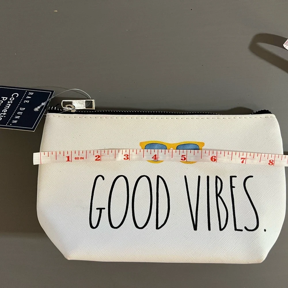 Rae Dunn White Pouch with Blue and Yellow Accents